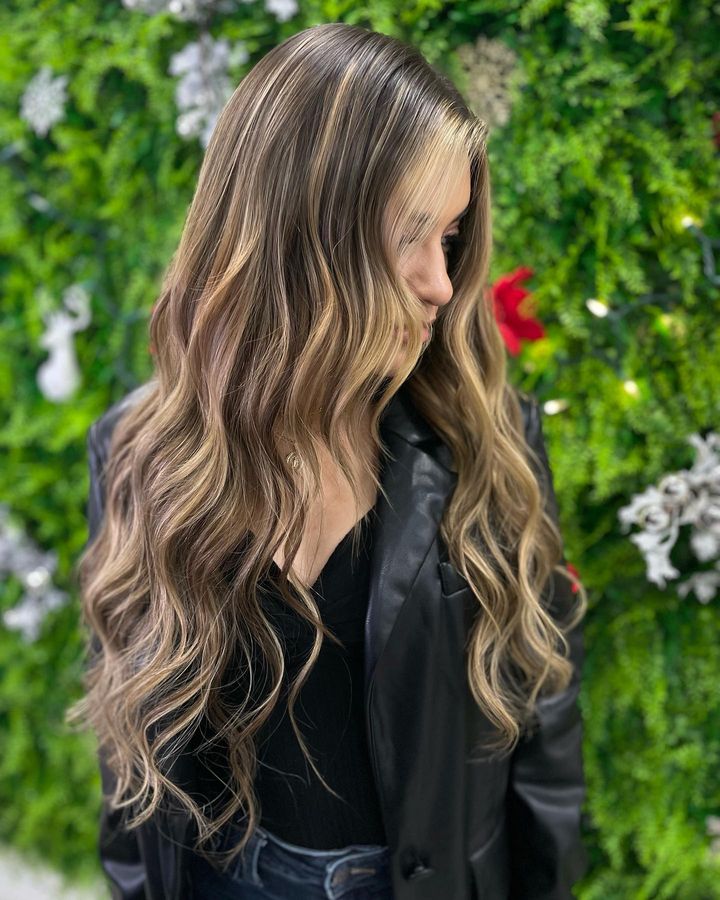 blonde highlights clip in hair extensions installed on las vegas women