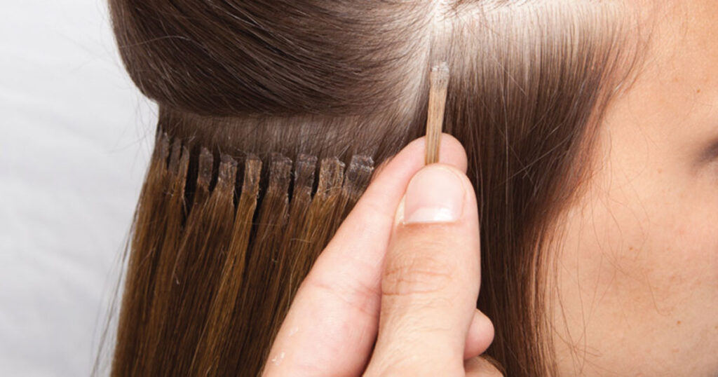keratin hair extensions close up of install on Las Vegas women