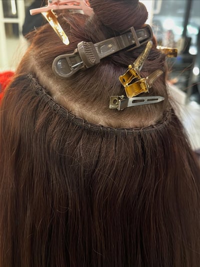 before photo of 2-row hand-tied sew-in extension installation with red hair hair transformation by Shirley Gonzalez at Hottie Hair salon Las Vegas - extensions service