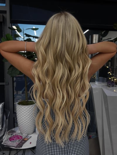 after photo of gorgeous blonde hand-tied extensions hair transformation by Miriam Perez at Hottie Hair salon Las Vegas - extensions service