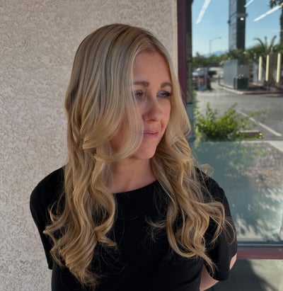 after photo of natural highlights on lovely blonde hair transformation by Kaylin Carlton at Hottie Hair salon Las Vegas - color service