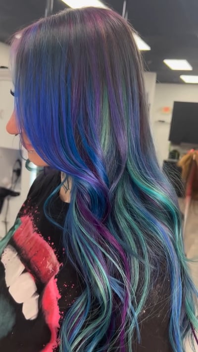 after photo of cosmic collaboration with rainbow hair extensions hair transformation by Niko Hernandez at Hottie Hair salon Las Vegas - extensions service