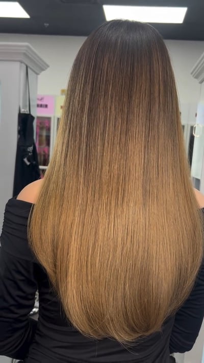after photo of color correction transformation: from copper red to blonde balayage hair transformation by Niko Hernandez at Hottie Hair salon Las Vegas - color service