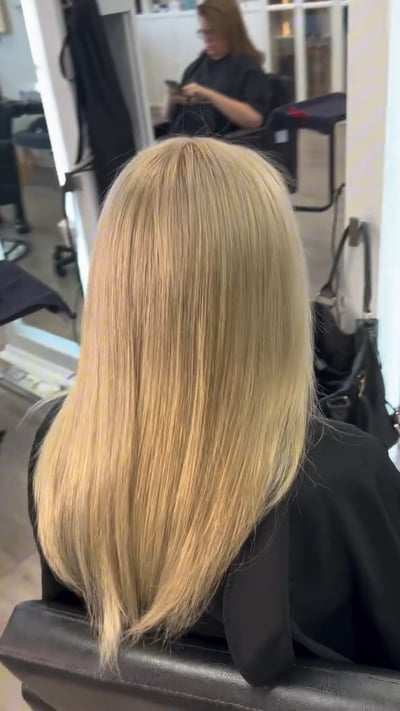 after photo of stunning bleach and tone transformation hair transformation by Niko Hernandez at Hottie Hair salon Las Vegas - color service