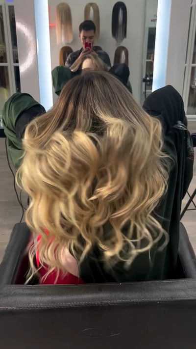 after photo of stunning blonde transformation with airtouch and extensions hair transformation by Niko Hernandez at Hottie Hair salon Las Vegas - extensions service