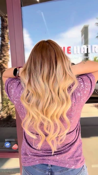 after photo of blonde transformation with added volume hair transformation by Dafne Lopez at Hottie Hair salon Las Vegas - color service