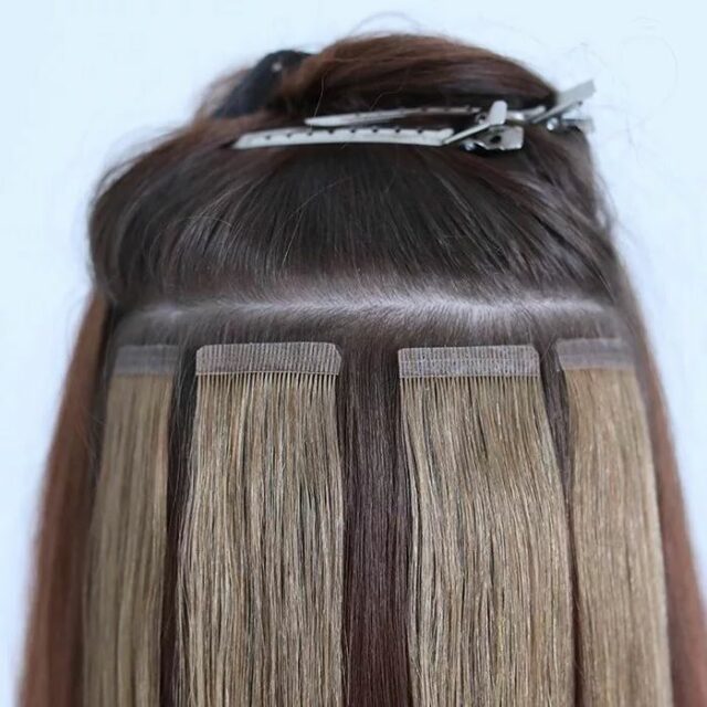 Women Showing Tape In Hair Extensions in Las Vegas Being Installed