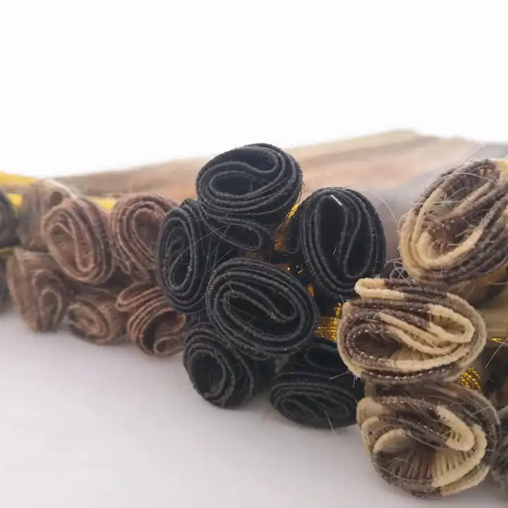 Bundles of Different Colors of Hand-Tied Hair Extensions