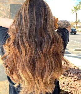 Warm Toned Highlights Balayage on Las Vegas Women With Blowout Styling and Haircut