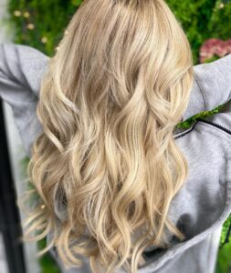 Sun-Kissed Blonde Balayage Look with Russian Weft Sew In Hair Extensions by Shannon in Las Vegas
